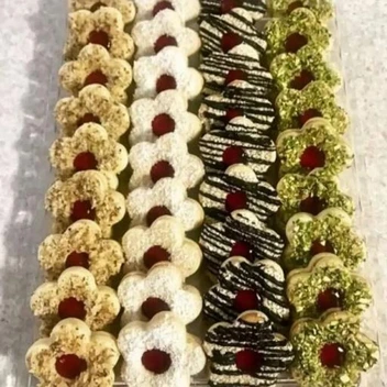 تصویر شیرینی مشهدی با مارمالاد خانگی اعلا 700 گرمی به قیمت 150000تومان 