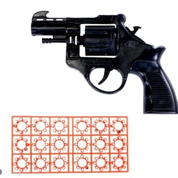 تصویر تفنگ ترقه ای با یک بسته تیر 