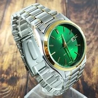 تصویر ساعت مردانه CASIO کاسیو مدل 1199 نقره ای،طلایی زمینه سبز 