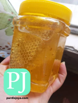تصویر عسل طبیعی با موم 