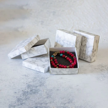 تصویر جعبه جواهرات 12 عددی بسته بندی شده مدل پایه کوتاه سنگی 
