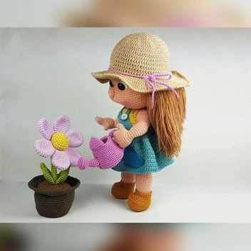 تصویر عروسک بافتنی دختر باغبان 