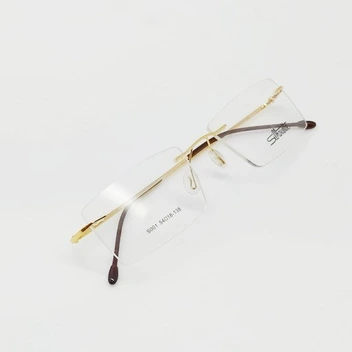 تصویر عینک طبی بی فریم فریم لس بدون قاب جنسیت فلزی تیتانیوم رنگ طلایی و نقره‌ای موجود هست 
